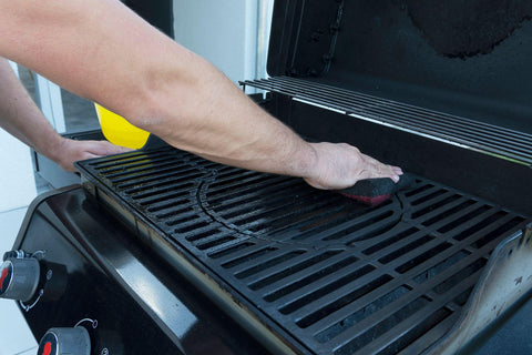 Close up of grill grate preparation