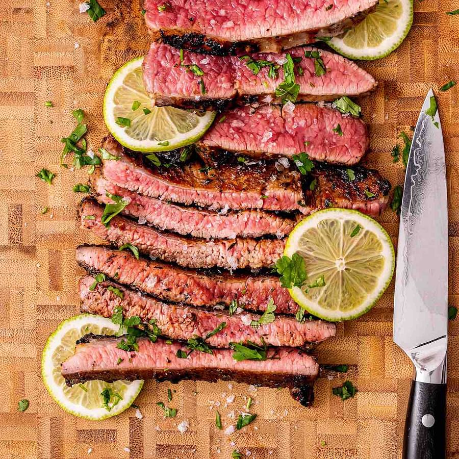 Juicy skirt steak grilling to perfection on a BBQ